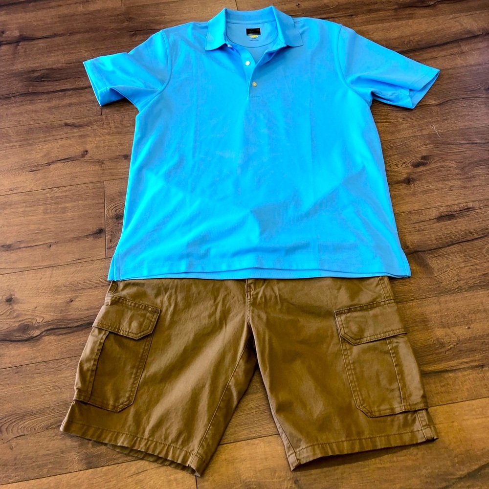 GREG NORMAN BLUE CLASSIC PLAY DRY POLO GOLF SHIRT IN SIZE MEDIUM